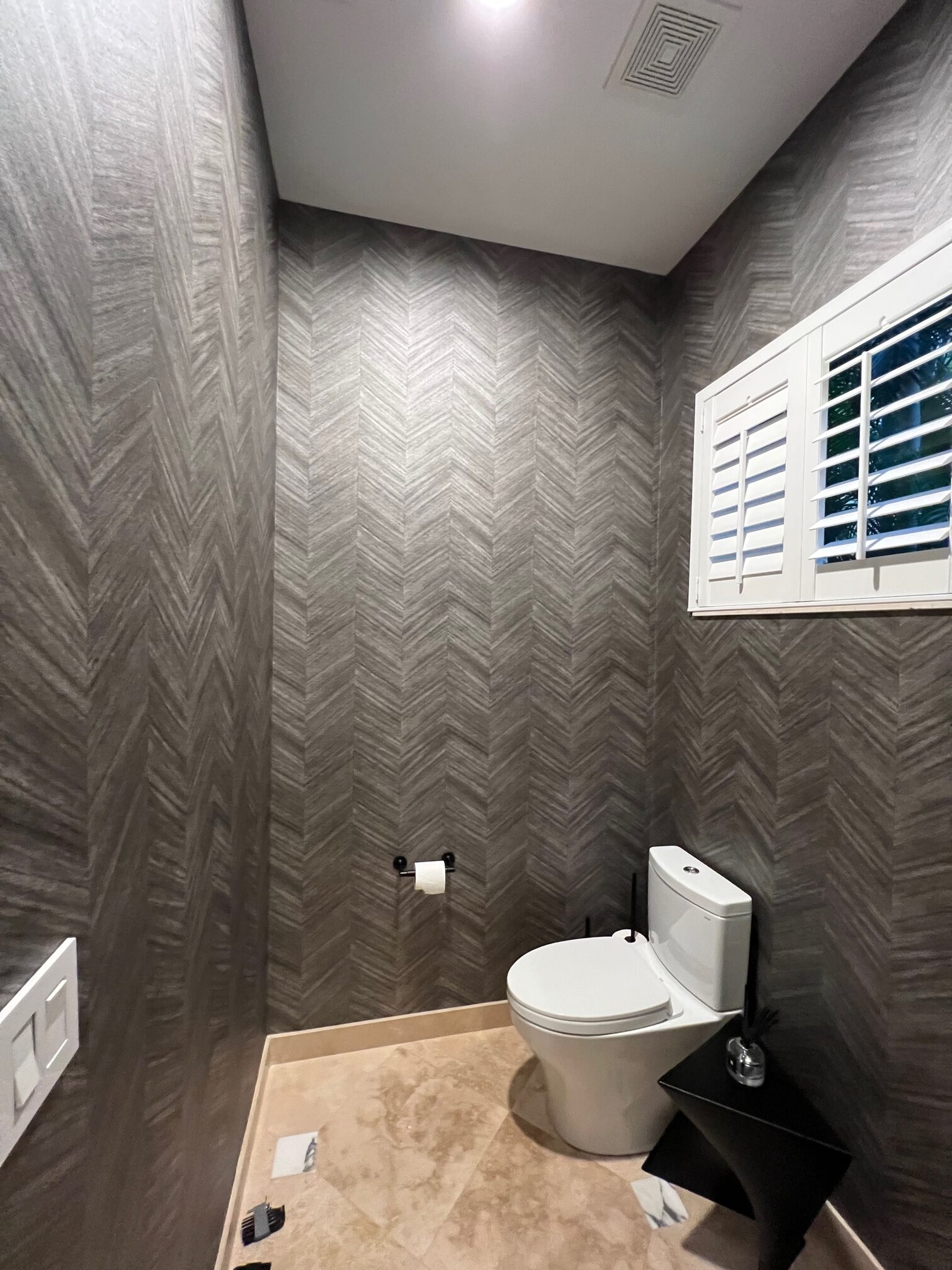 Retail showroom with chevron pattern vinyl wallpaper
